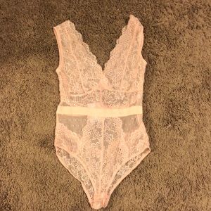 Sheer pink bodysuit